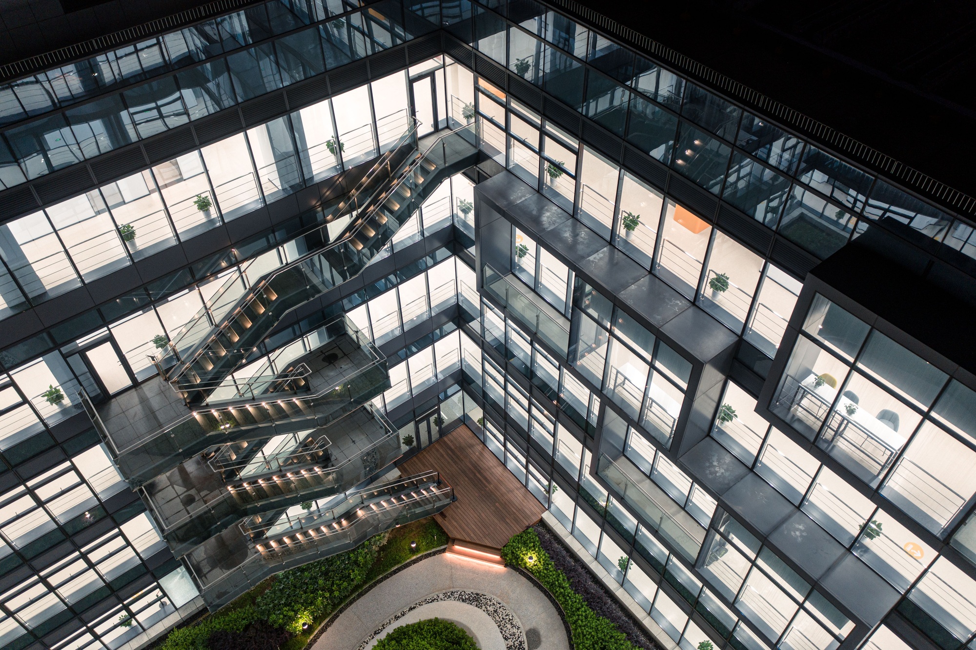 Courtyard garden of a high-tech company illuminated at night